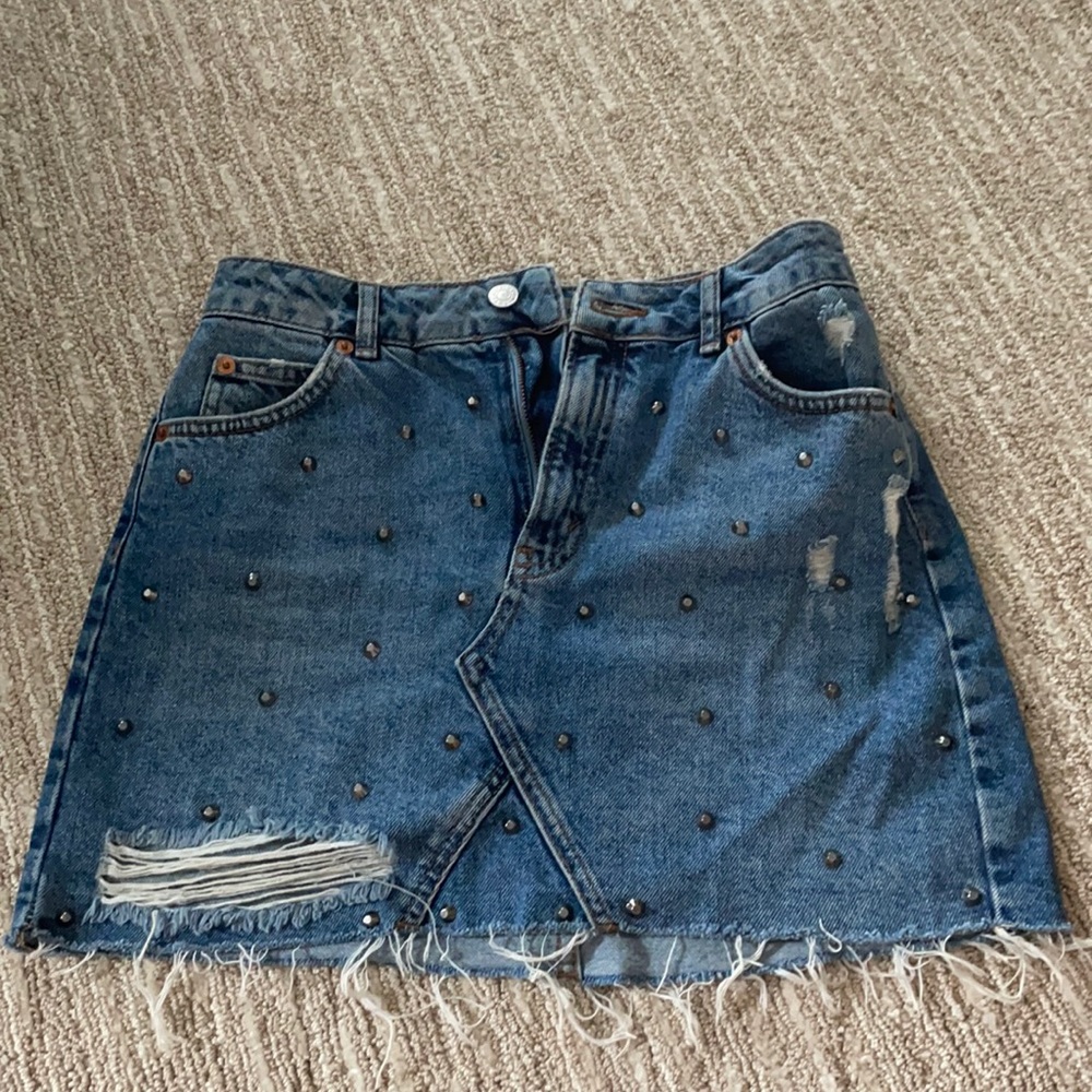 TopShop studded, distressed jean skirt